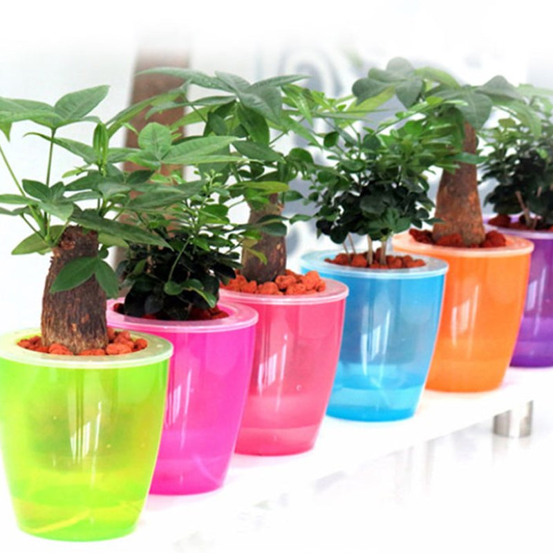 self watering plastic plant pots Self Watering Planters